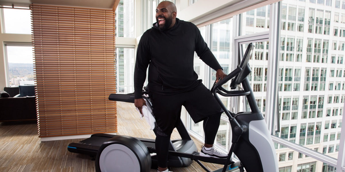 Man finishing a workout on a Precor EFX 865 Elliptical Fitness Crosstrainer (EFX)