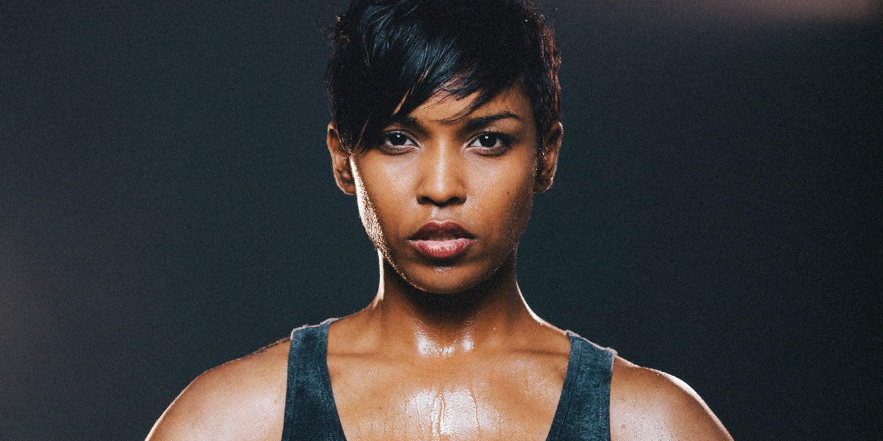 Close up on a woman exerciser’s face