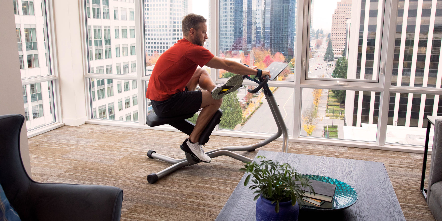 Male exerciser stretching on the Precor StretchTrainer 240i for flexibility and recovery