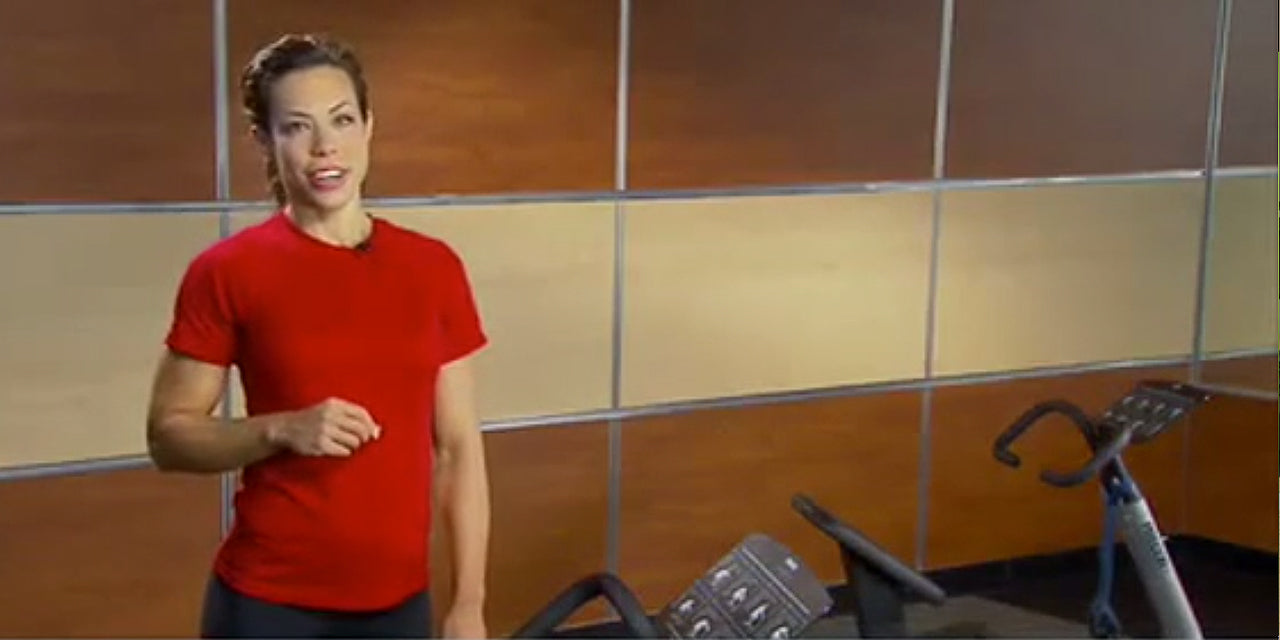 Personal trainer in front of a Precor 240i StretchTrainer