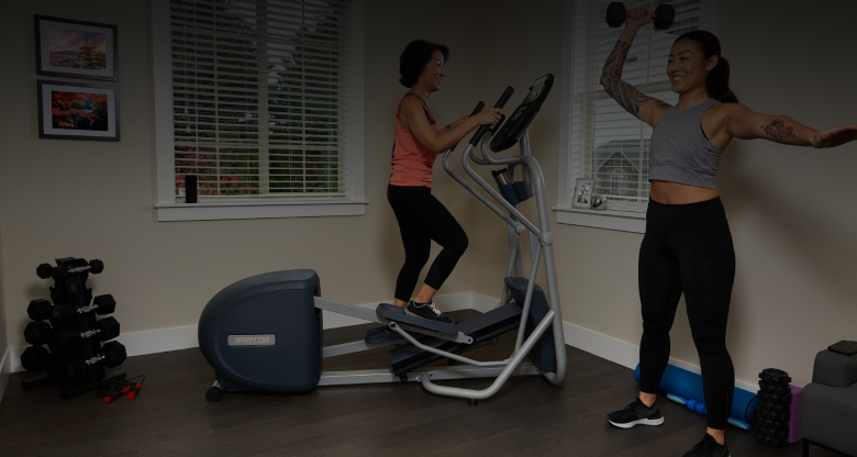 Male and female exercisers in a professional gym environment in front of a row of Precor RSL Resolute Selectorized Line of Strength equipment