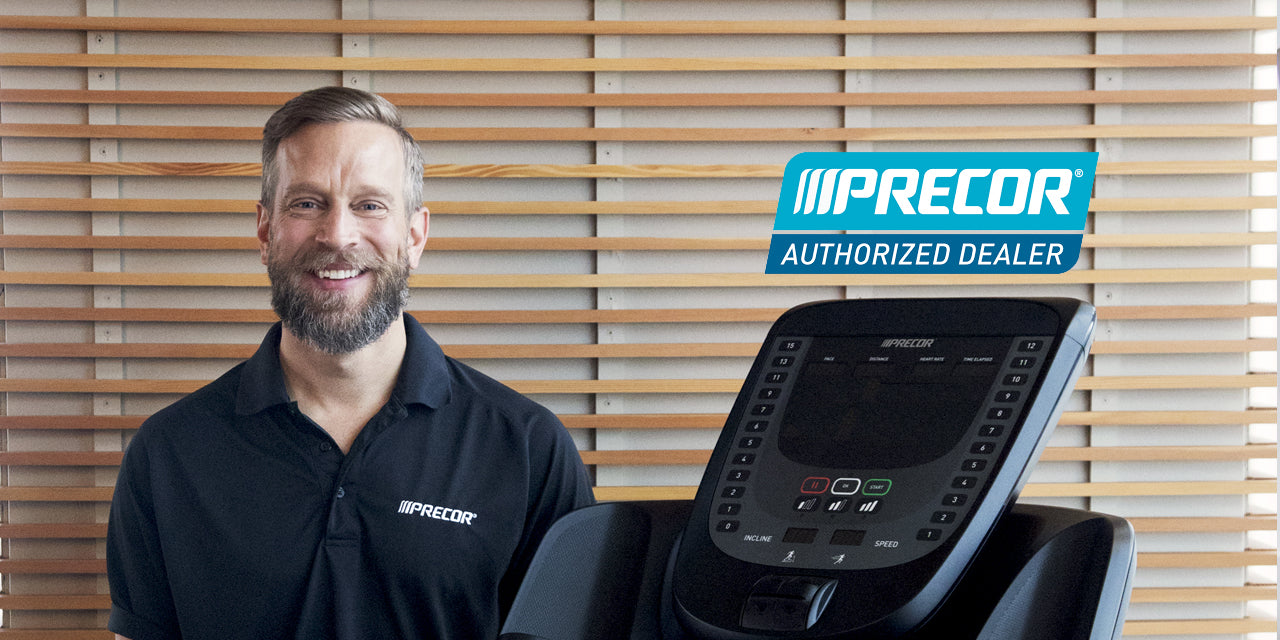 Male Precor sales representative next to a Precor TRM 731i interval treadmill with a Precor authorized dealer logo on the image