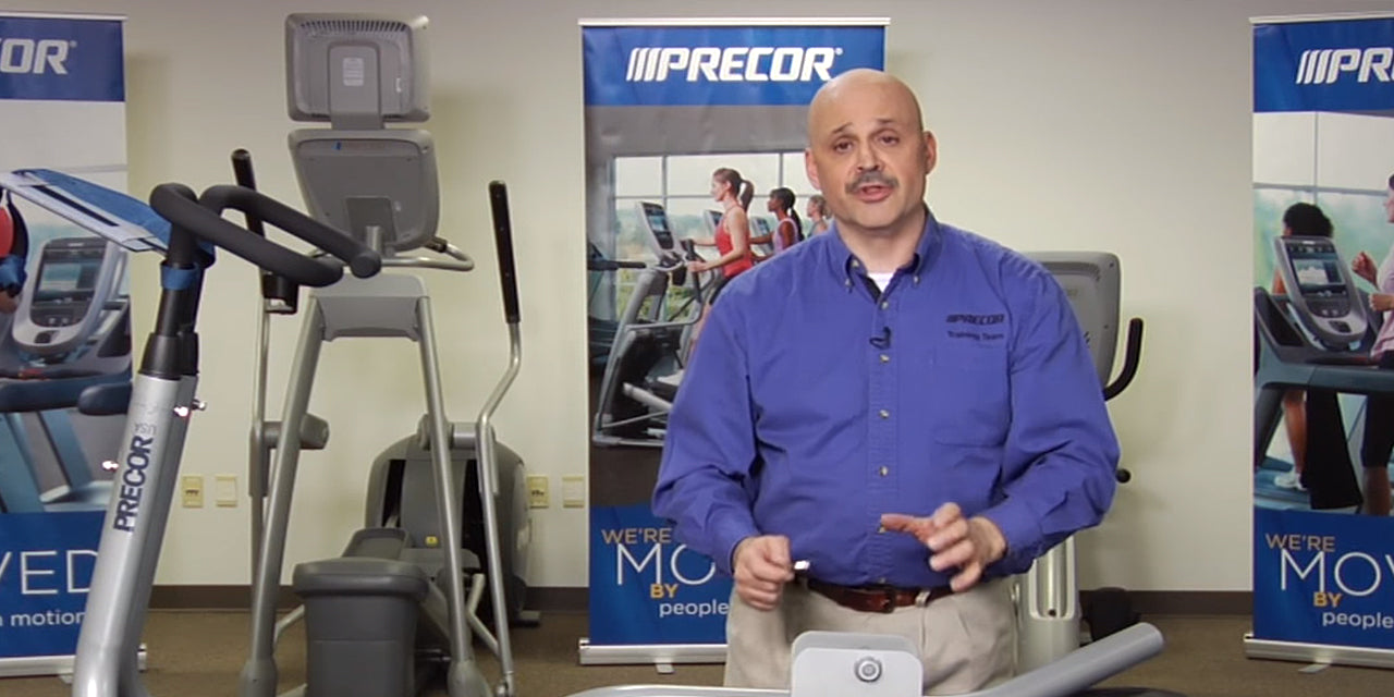 Man in Precor showroom in front of a Precor 240i StretchTrainer