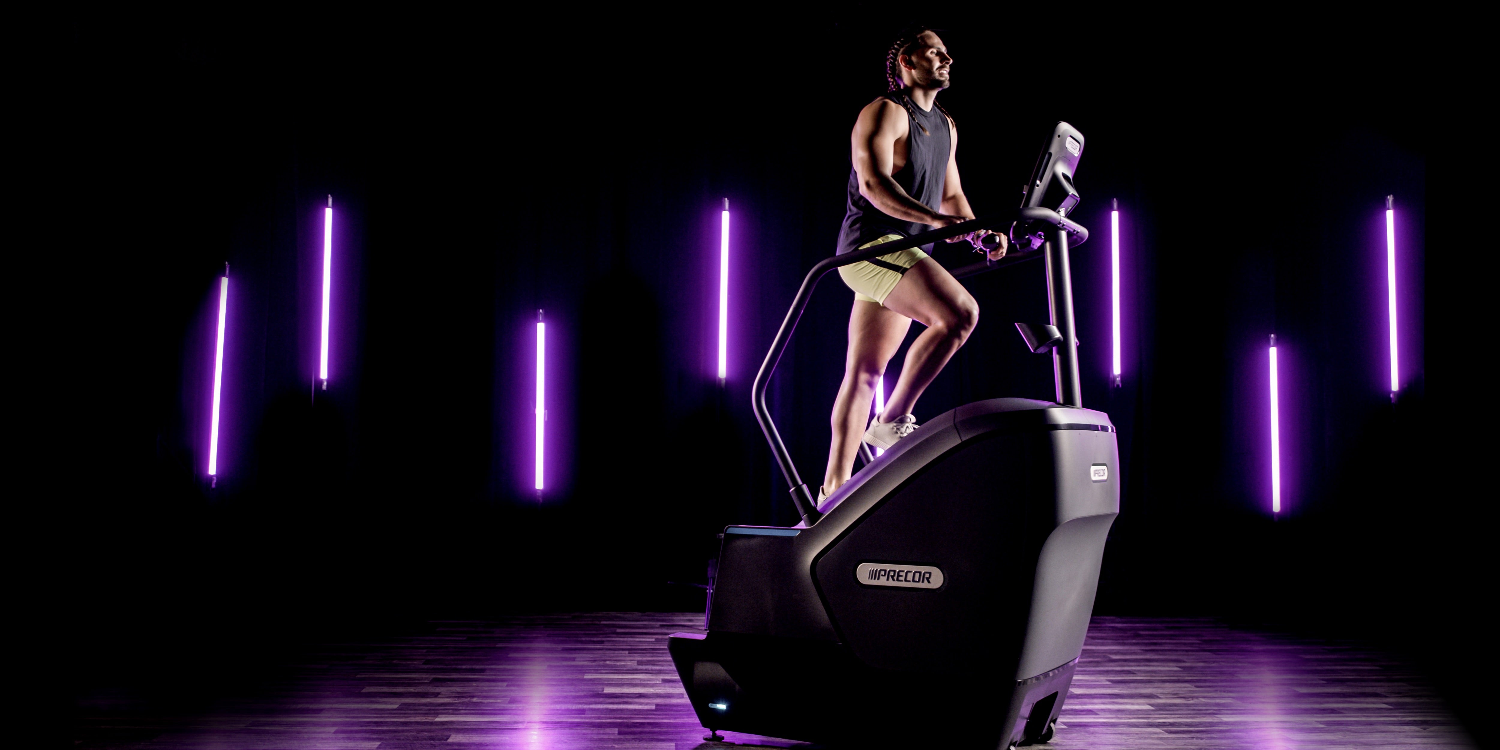 male exerciser cardio workout on the Precor SCL 835 stairclimber